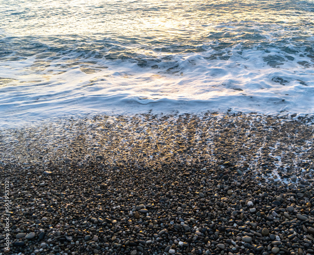 Sea Waves on Pebble Beach Texture Background Sea Waves on Pebble Beach Texture Background