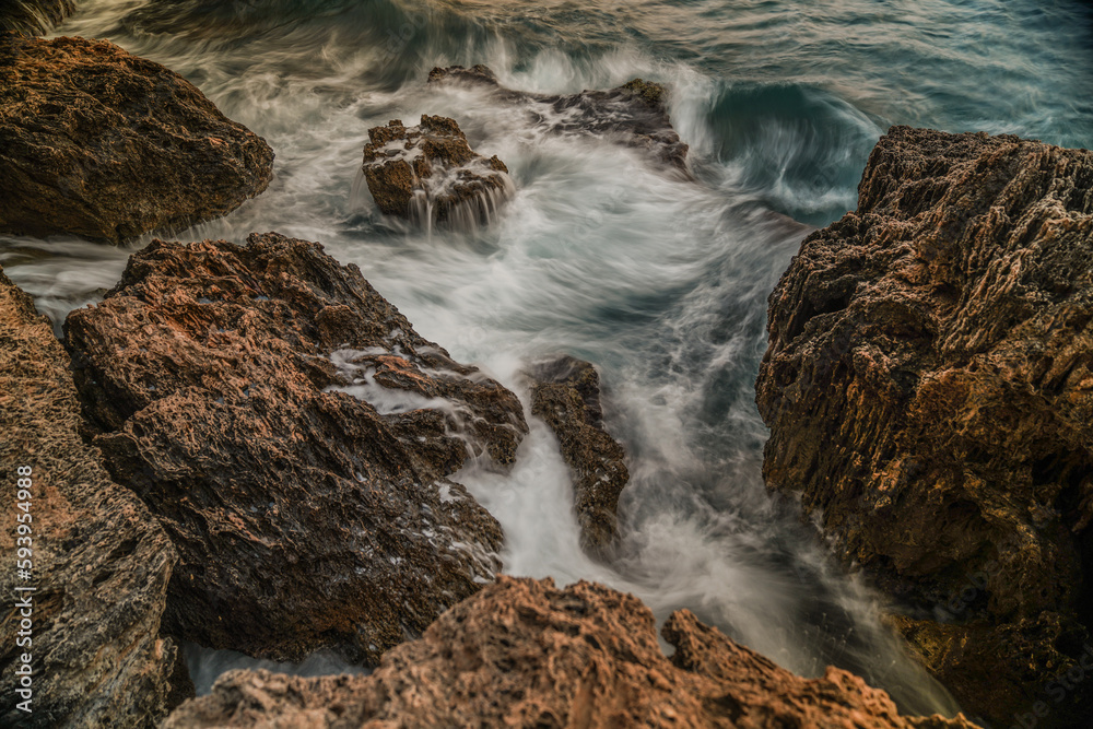 sea waves crashing against the rocks sea waves crashing against the rocks
