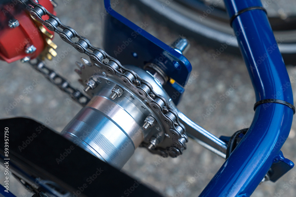 Rear axle of a bicycle with chain and gear. Close up. Rear axle of a bicycle with chain and gear. Close up.