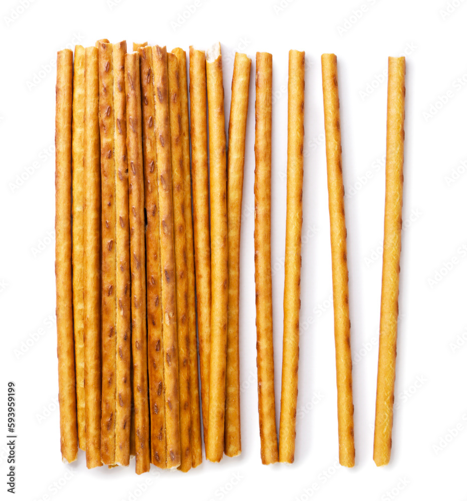 Pretzel sticks scattered on a white background. Top view Pretzel sticks scattered on a white background. Top view
