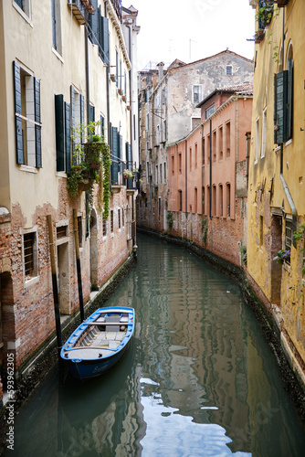 Venice: landscape with the image of boats on a channel in Venice, Italy