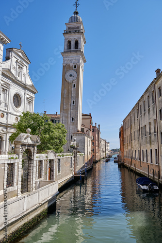 Venice: landscape with the image of boats on a channel in Venice, Italy