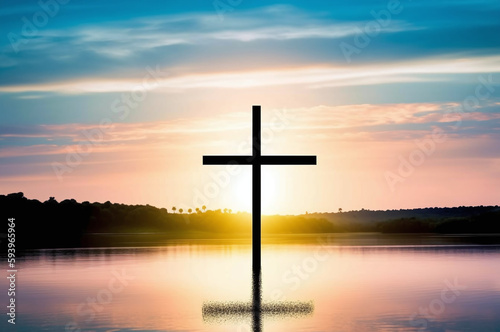 Sunrise over a cross on water