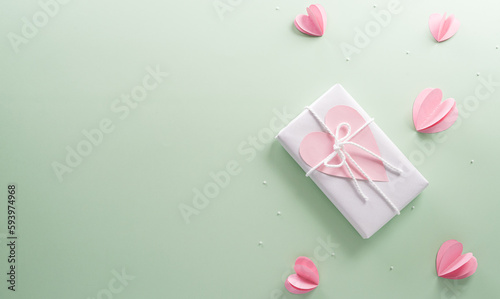 Happy Mother's day and Women's Day decoration concept made from gift box and heart on pastel background.