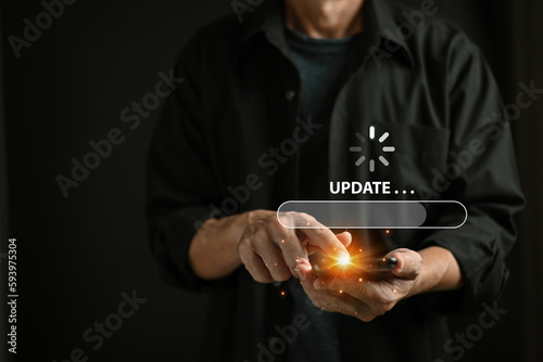 Businessman using mobile phone loading data with loading bar icon over a wireless , update concept and business transformation Loading icon on screen.