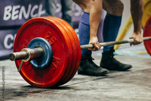 part body male powerlifter deadlift in powerlifting competition, power sports games