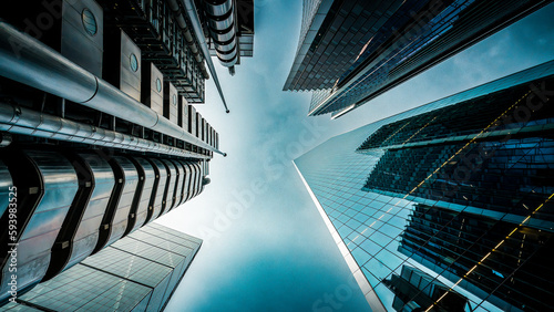 Canvas Print Looking up at towering modern skyscrapers