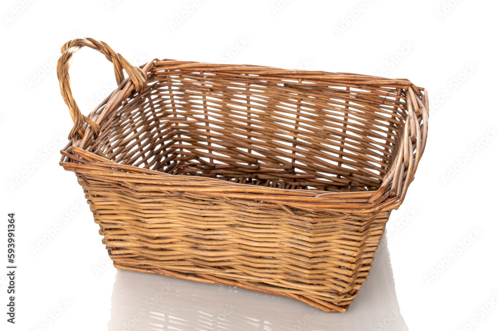 One basket woven from vines, macro, isolated on white background.