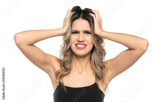 Young woman scratching head on white background. Annoying itch