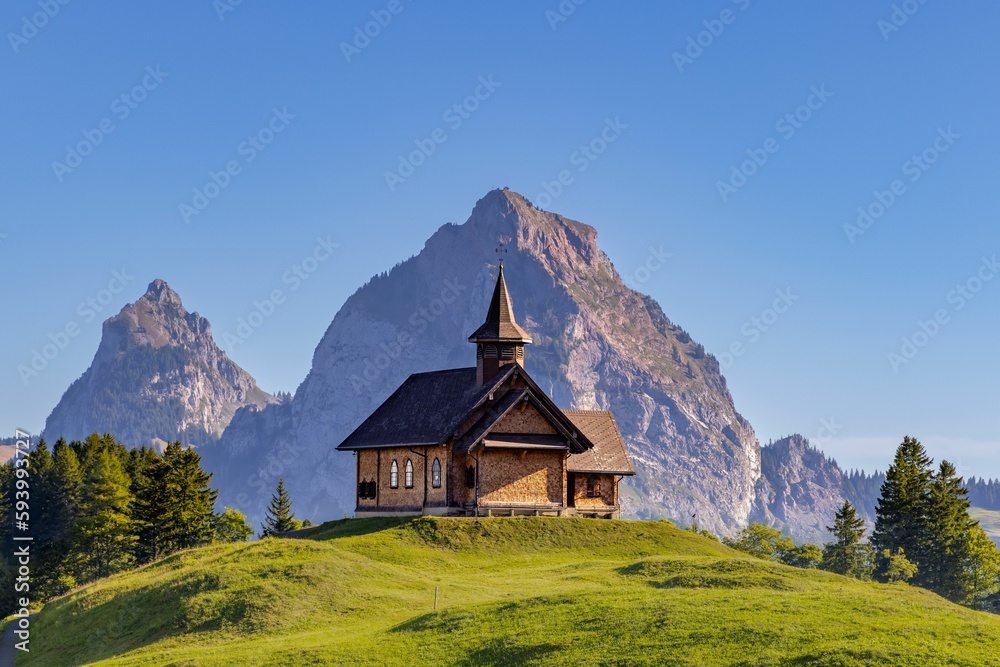Scenic view of the historic The Maria Hilf Chapel on an evergreen mountain in Morschach, Switzerland