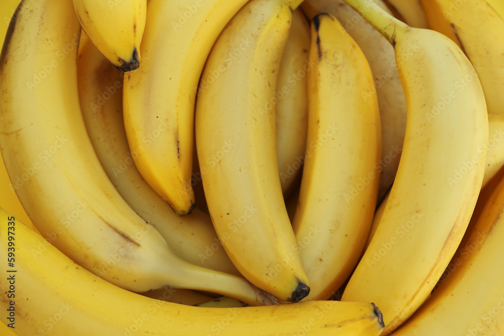 Many tasty bananas as background, closeup view