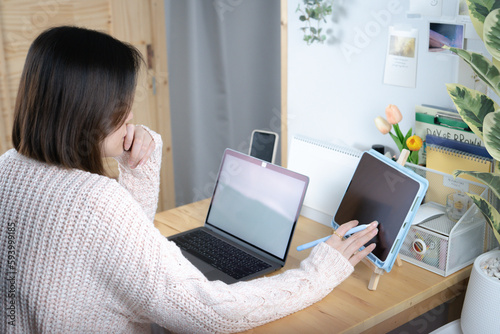 asian woman use laptop and internet for conference online and work from home