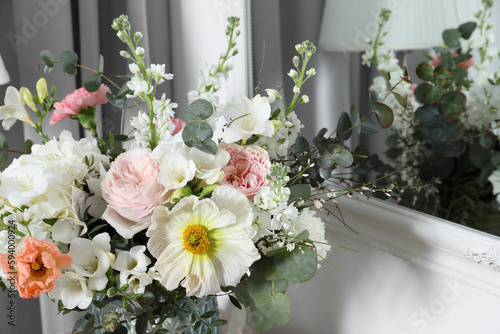Beautiful bouquet of different fresh flowers indoors, closeup