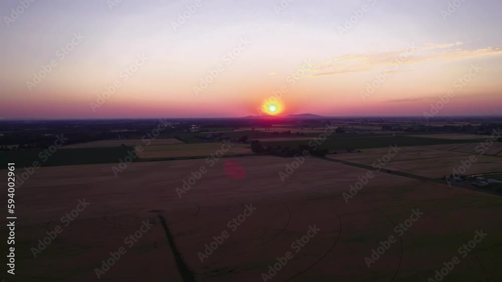 Drone view of Rexburg Farm in Wyoming at sunset Drone view of Rexburg Farm in Wyoming at sunset