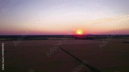 Aerial video of Rexburg Farm Fields during scenic sunset, Wyoming, USA photo