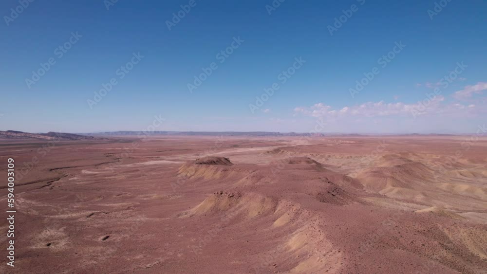 Aerial video of dry rocky mountains and blue sky, Crescent Junction, Utah, USA Aerial video of dry rocky mountains and blue sky, Crescent Junction, Utah, USA