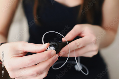 Woman placing a filled reservoir in her insulin pump