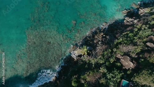 Aerial shot of a beach bungalow in Magens bay, turquoise crystal clear water Virgin Islands photo