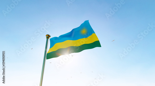 Rwanda flag. 3D realistic waving flag background. Flag of Rwanda flag waving in the wind, sky and sun background. 