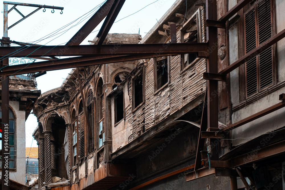 Historic wooden facade of a building ruin in old town of Damascus