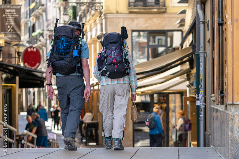 Adult couple doing the Way of St. James. Pamplona Adult couple doing the Way of St. James. Pamplona