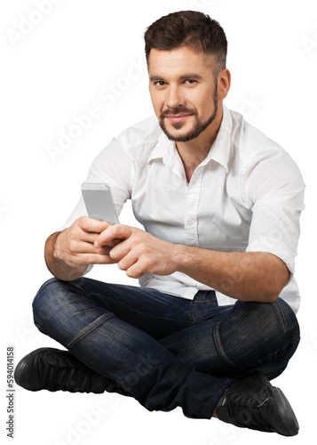 Portrait of young handsome man using phone isolated on white background