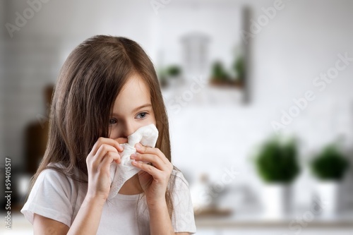 Fototapete Sad small child hold tissue sneeze
