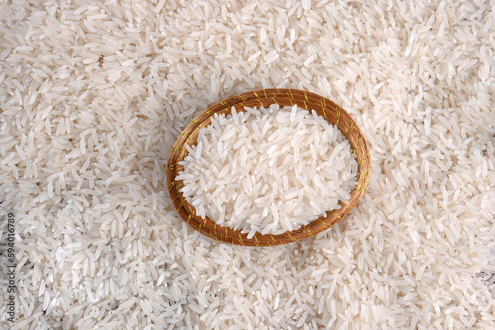 white rice natural long rice grain on wooden table use texture background white rice natural long rice grain on wooden table use texture background