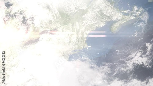 Earth zoom in from outer space to city. Zooming on Holyoke, Massachusetts, USA. The animation continues by zoom out through clouds and atmosphere into space. Images from NASA photo