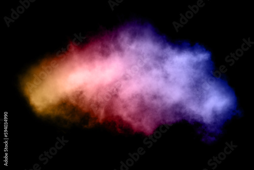 Colored smoke after an explosion on a black background.