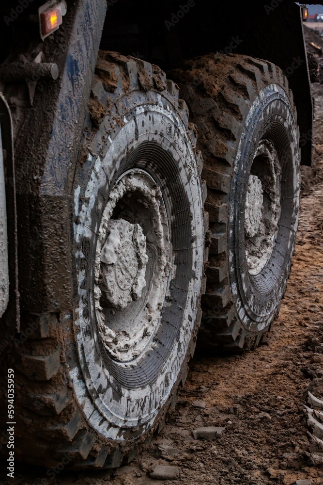 Dirty truck wheels close-up photo. Dirty truck wheels close-up photo.
