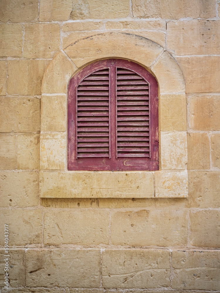 old window with shutters