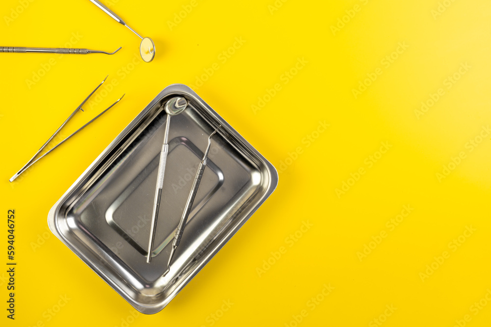 Teeth care and dental health background with dental equipment tools Teeth care and dental health background with dental equipment tools
