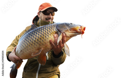 Fishing transparent background. Young man hold big carp in his hands. 