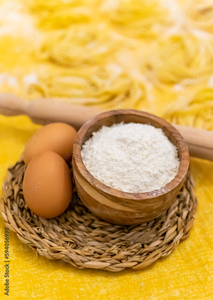 Close up of Pasta and Hands making home made Italian Pasta Close up of Pasta and Hands making home made Italian Pasta