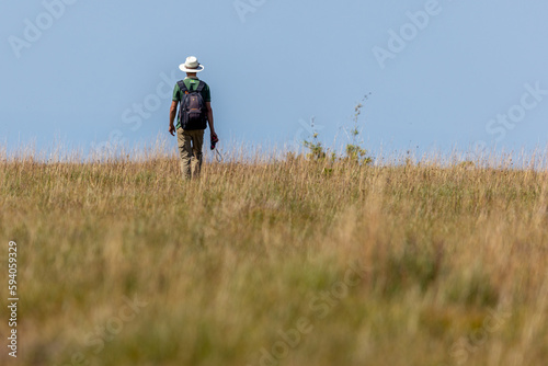 person riding in field 