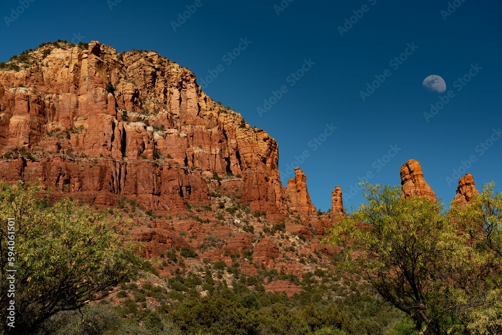 Landscape of the beautiful sandstone formations at moonrise in Sedona