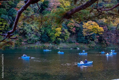 Hozugawa River Boat Ride in Autumn  Blue Rowboat  Red Yellow Orange Autumn Leaves Scenery