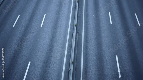 Aerial top view of stucked cars in a traffic jam. Cars turning on the highway.