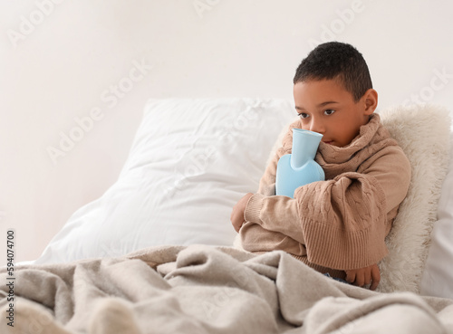 Ill African-American boy wi...