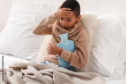 Ill African-American boy wi...