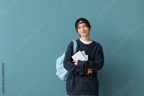 Male student with books and...