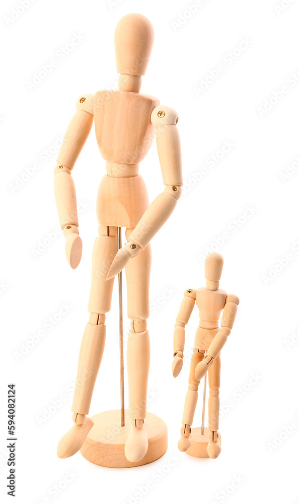 Wooden mannequins isolated on white background Wooden mannequins isolated on white background