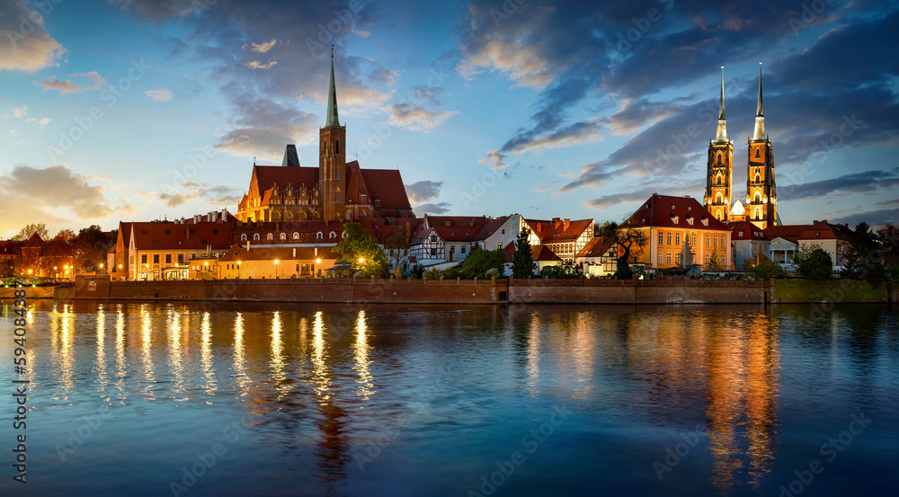 Panoramic evening view on Wroclaw Old Town. Island and Cathedral of St John with bridge through river Odra. Wroclaw, Poland.