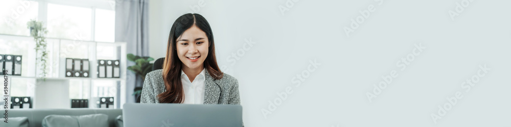 Online consulting with laptop in office of asian thai japanese chinese female exclusive lawyer legal advisor, legislation, saleswoman, legal contract documents Online consulting with laptop in office of asian thai japanese chinese female exclusive lawyer legal advisor, legislation, saleswoman, legal contract documents
