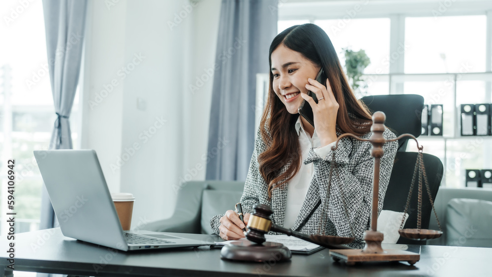 Call mobile, cellphones, Online consulting with laptop in office of asian thai japanese chinese female exclusive lawyer legal advisor, legislation, saleswoman, legal contract documents Call mobile, cellphones, Online consulting with laptop in office of asian thai japanese chinese female exclusive lawyer legal advisor, legislation, saleswoman, legal contract documents