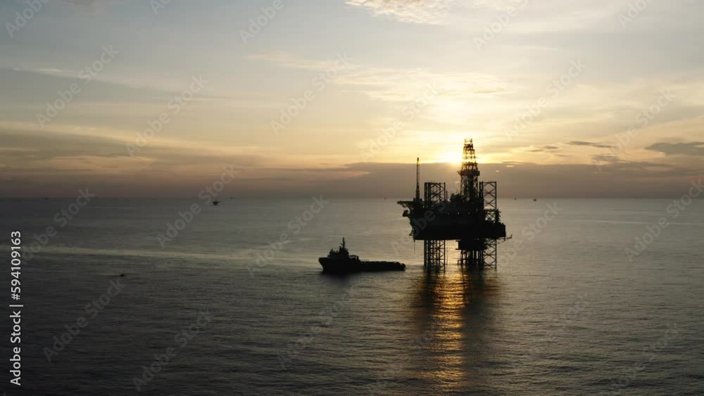 Jack up drilling rig and production platform in the middle of the ocean at sunrise time
Jack up drilling rig and production platform in the middle of the ocean at sunrise time
