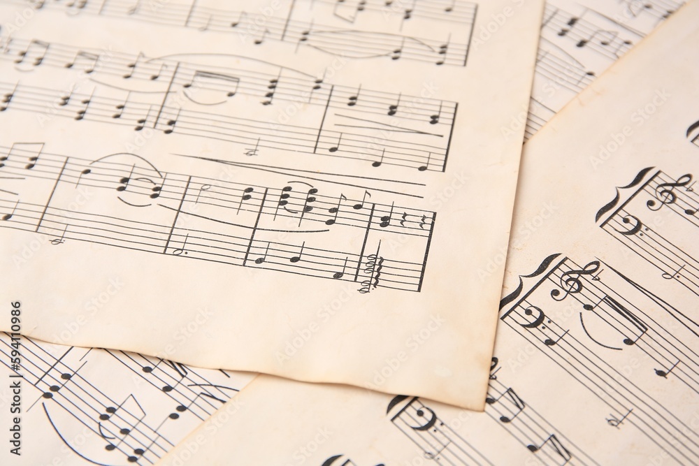 Sheets of paper with different notes as background, closeup Sheets of paper with different notes as background, closeup