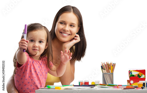 Happy young mother and daughter painting