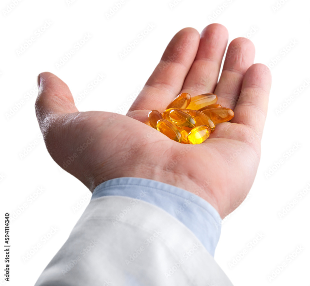 Man holding pills on hand Man holding pills on hand